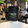 Custom printed biodegradable paper cup with black lid with logo of 'Liberty Gym'